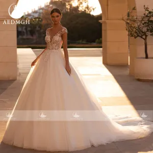 Denisse Ball Gown Wedding Dress Sweetheart Cap Sleeve Court Train Graceful Beading Appliques